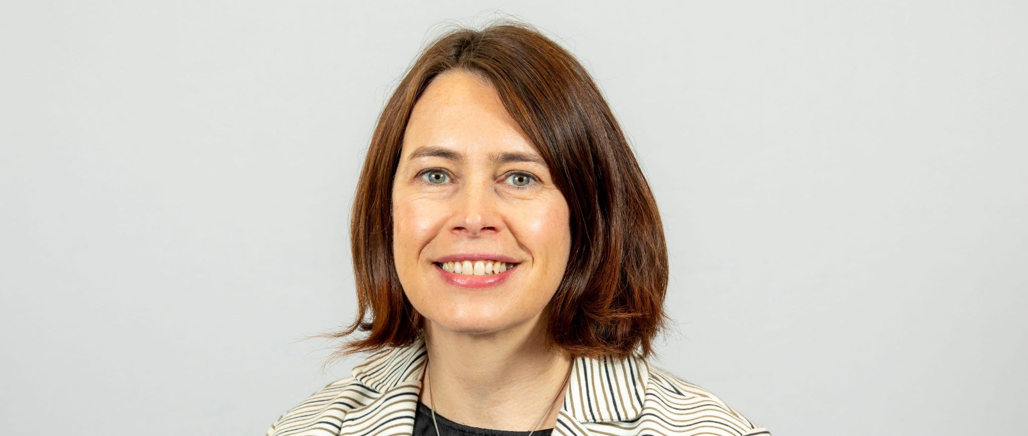 An image of Aideen O'Neill smiling at the camera.