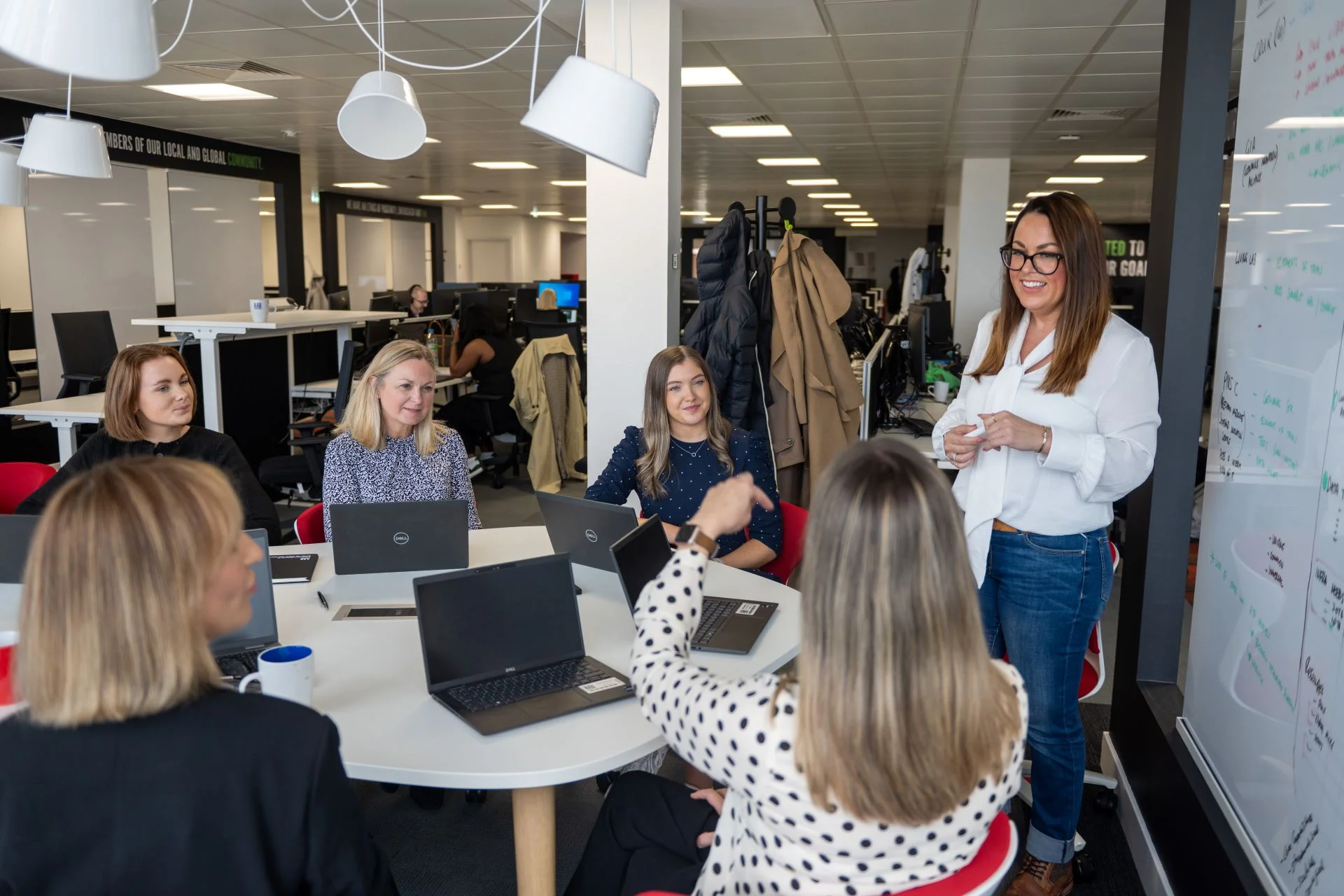 AAB People at team meeting in the office.