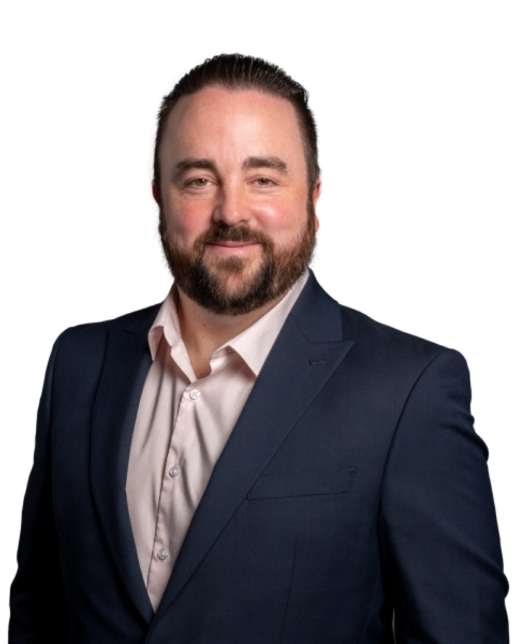 Adam Flight head and shoulders shot, smiling against a white background