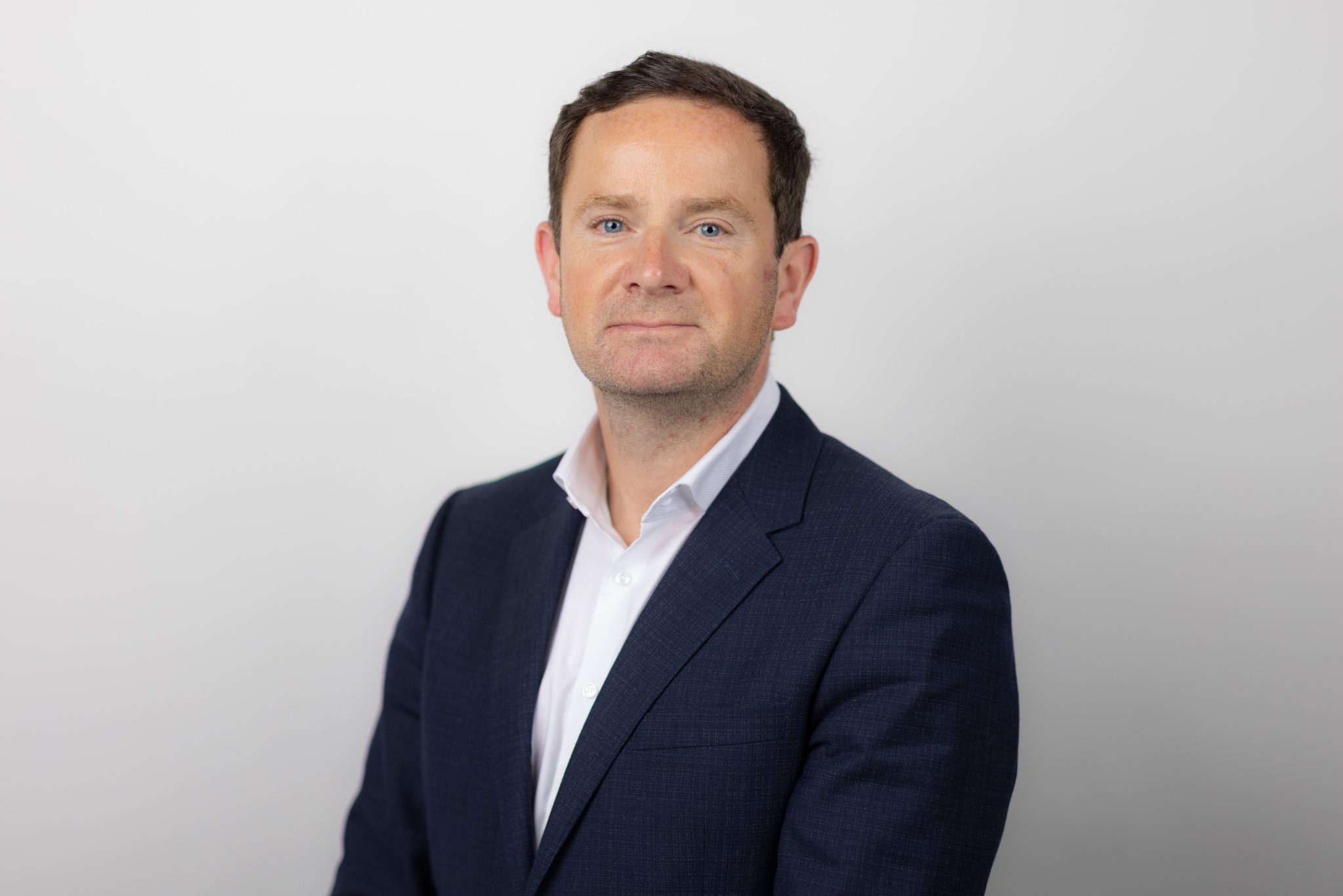 John Conway in blue suit.